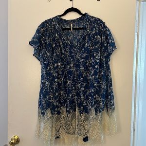 Blue floral tunic dress with navy blue slip under